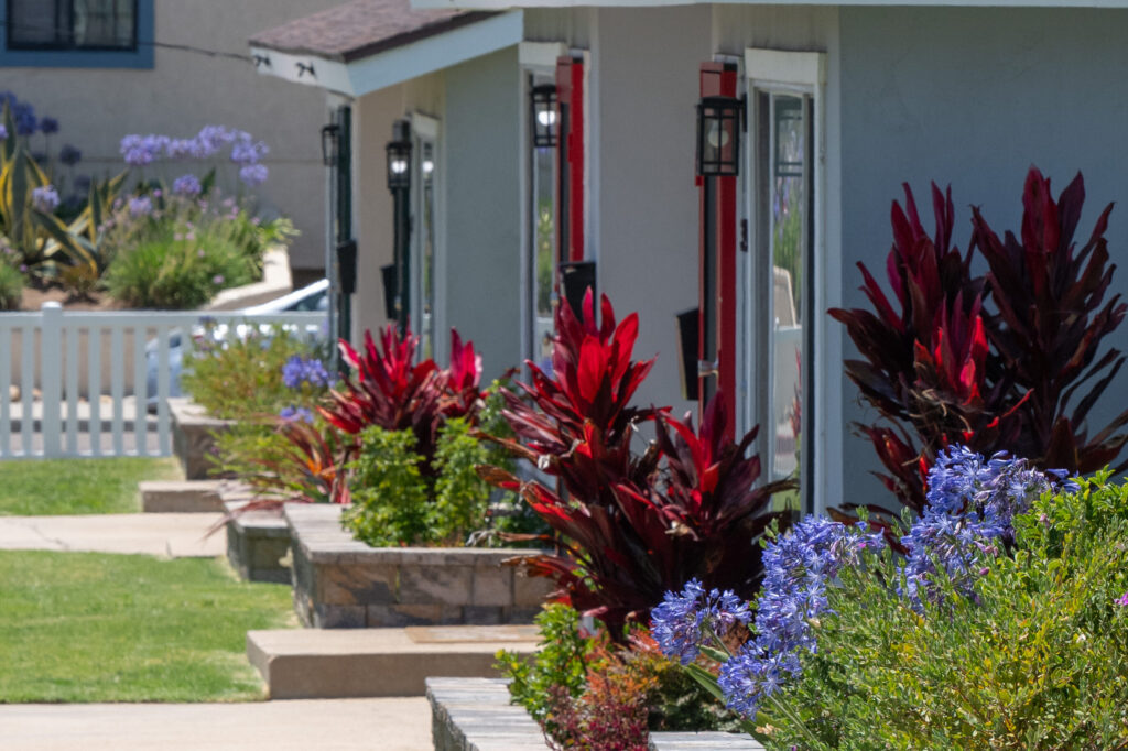 Home Renovated coastal bungalow residence with landscaped front yard and attached garage in Imperial Beach.